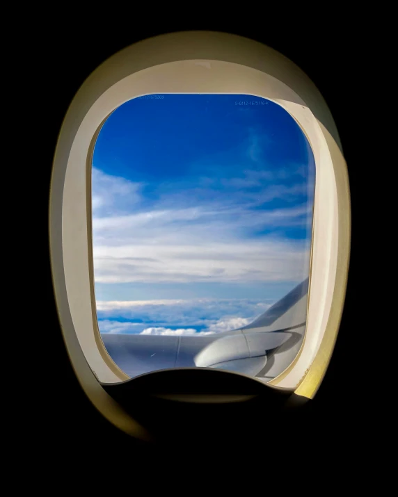 a view from an airplane window with the wing