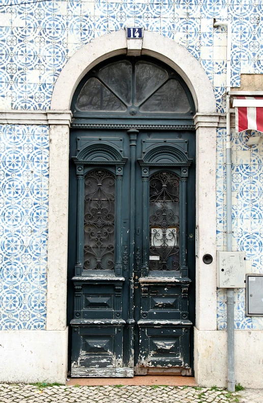 a wooden door is sitting open to a window
