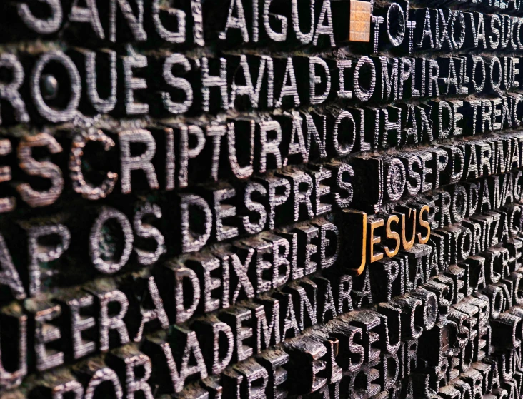 words are displayed on the wall of the temple