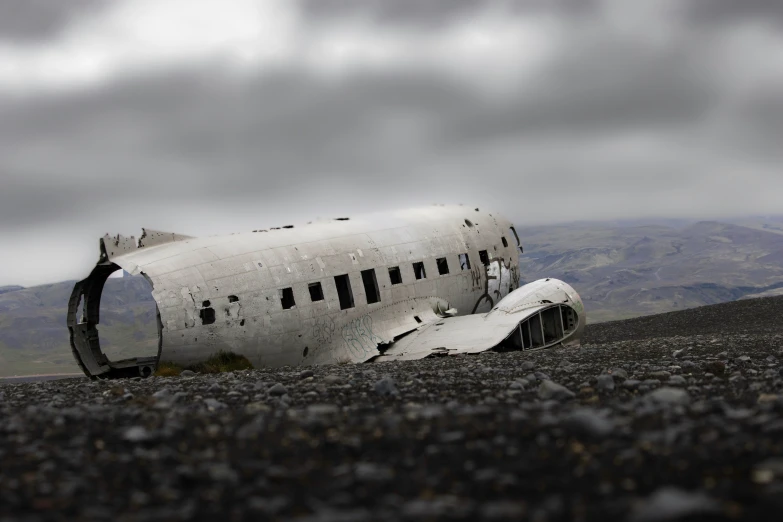 an abandoned airplane in the middle of nowhere