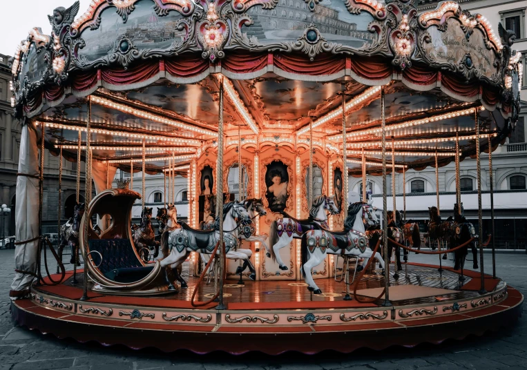 this is an ornately decorated merry go round for riding the merry go round