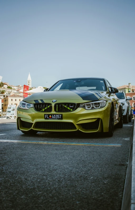 the bmw is going around on track on the side of the road