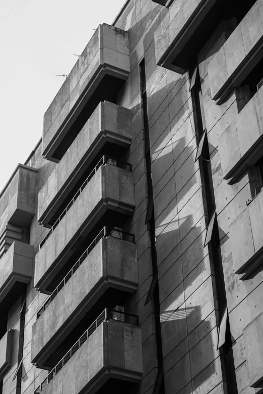 the side of an apartment building with balconies