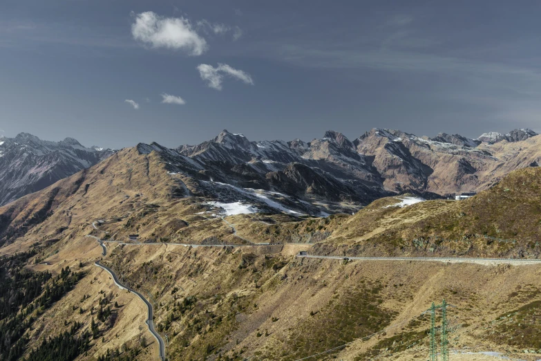 a scenic view of a high mountain road