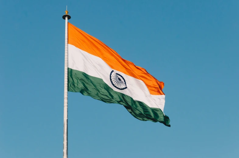 the indian flag waving high in the sky