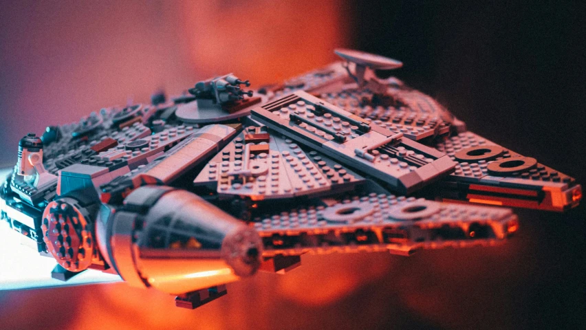 a lego millennium falcon with a light in it