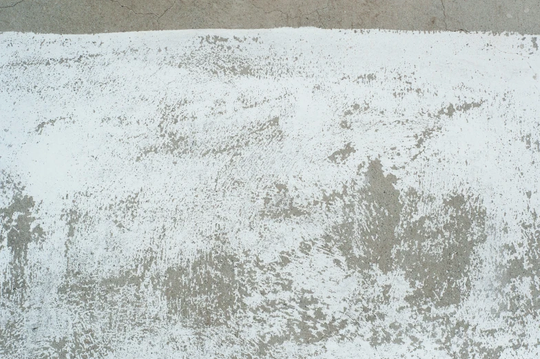 snow covered ground with very few dots in the middle