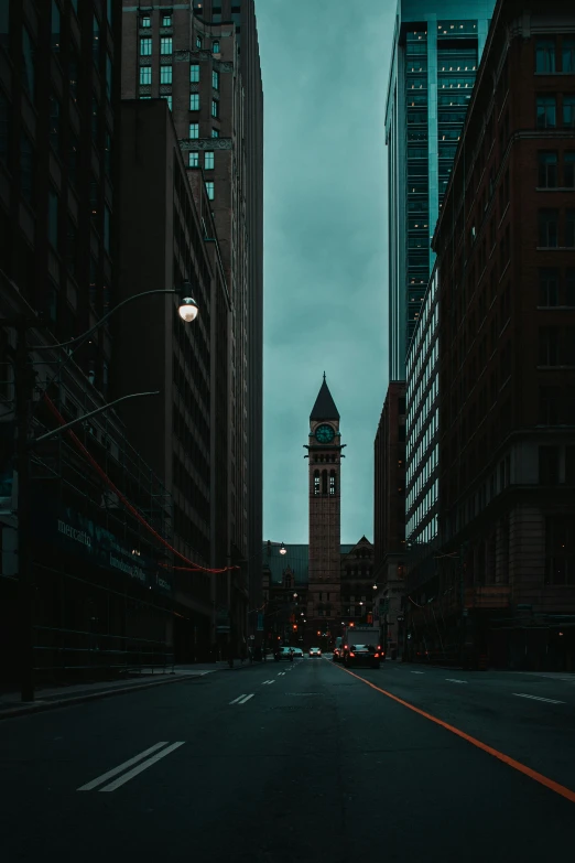 a clock tower on top of some buildings