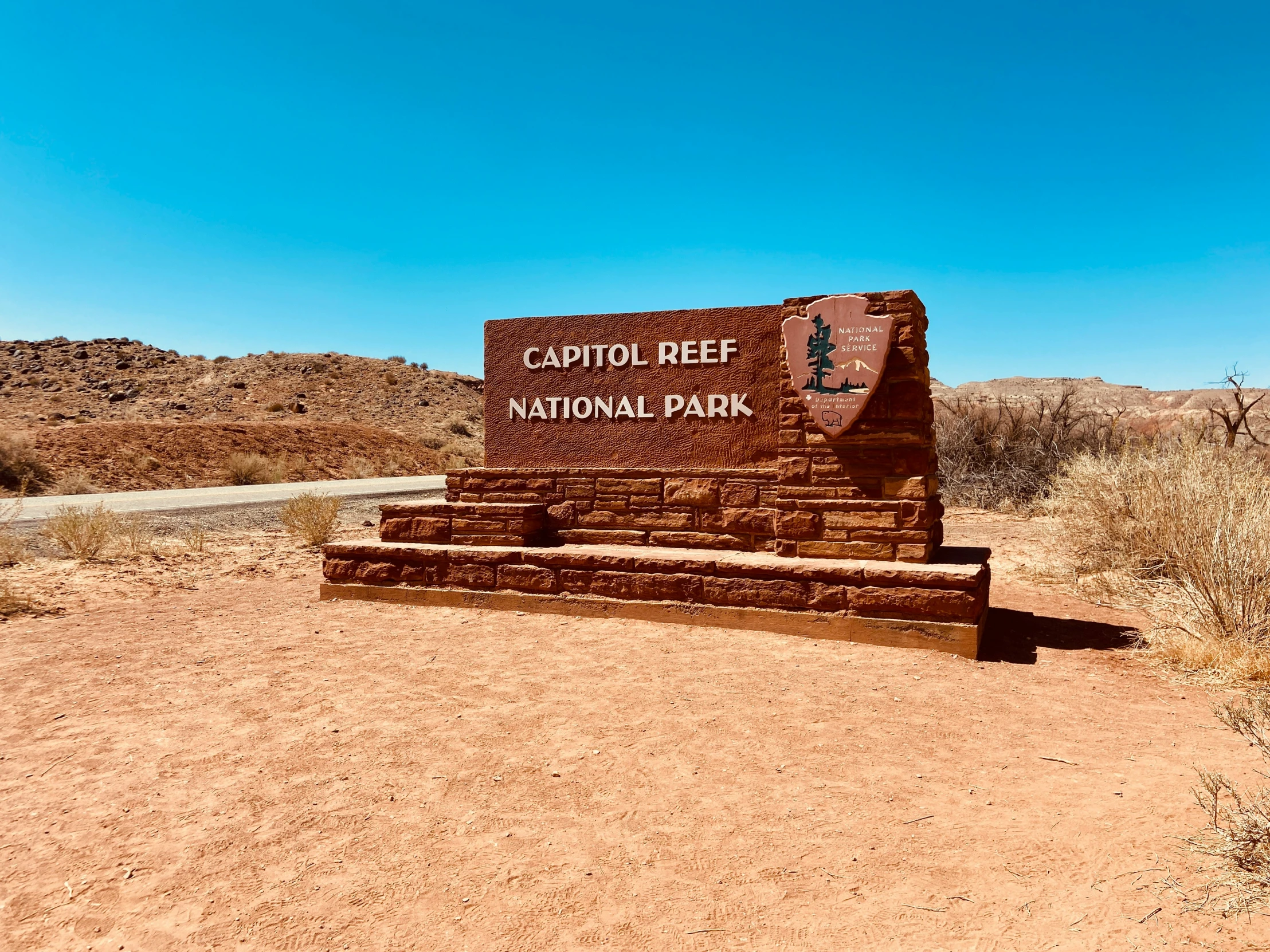 a sign for the capitol reef national park