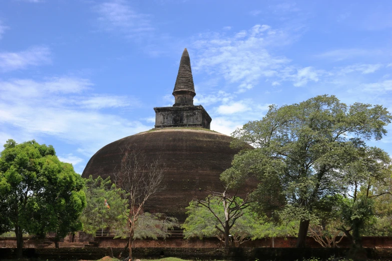 the large dome building has a tall spire