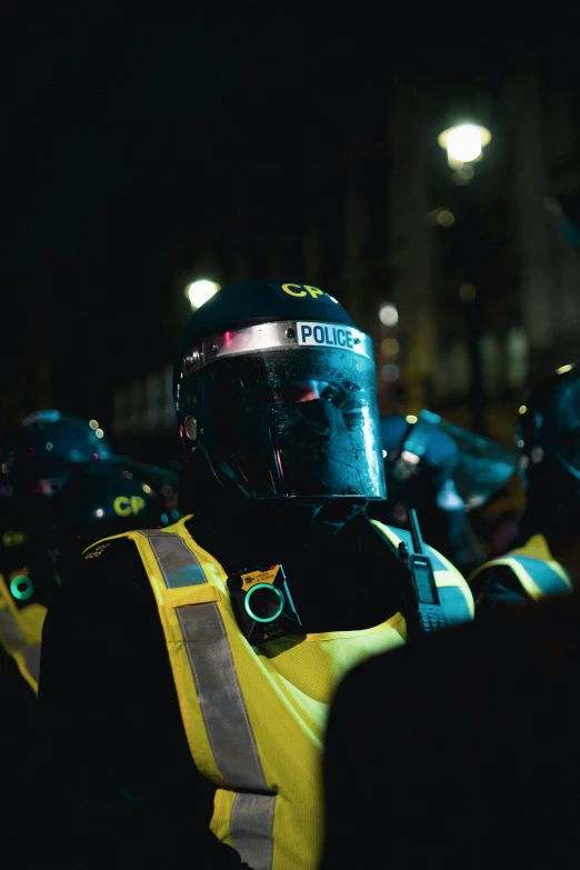 police officers in yellow vests on a street