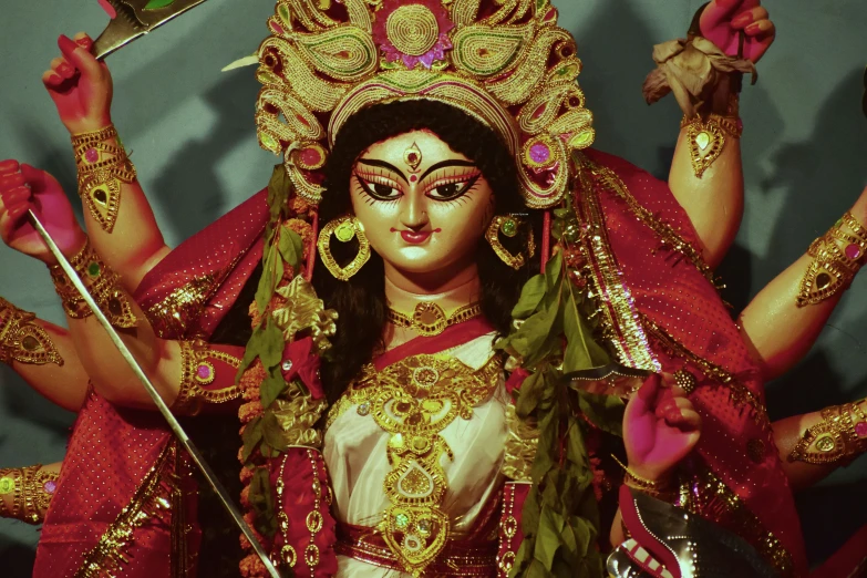 an ornate sculpture depicting a hindu goddess