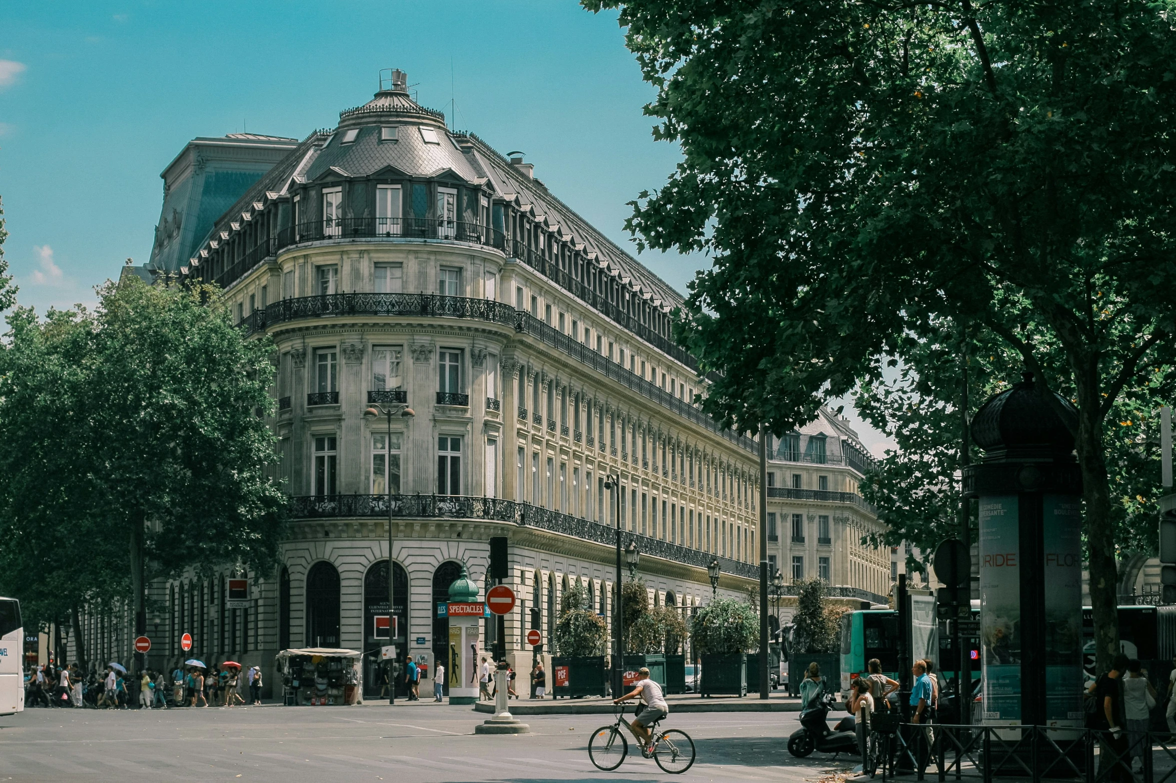 a person is riding a bicycle on the street