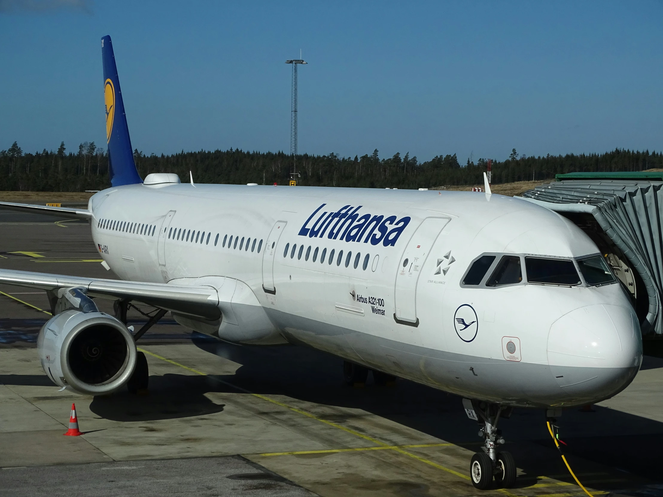 an airplane being loaded at the end of the runway