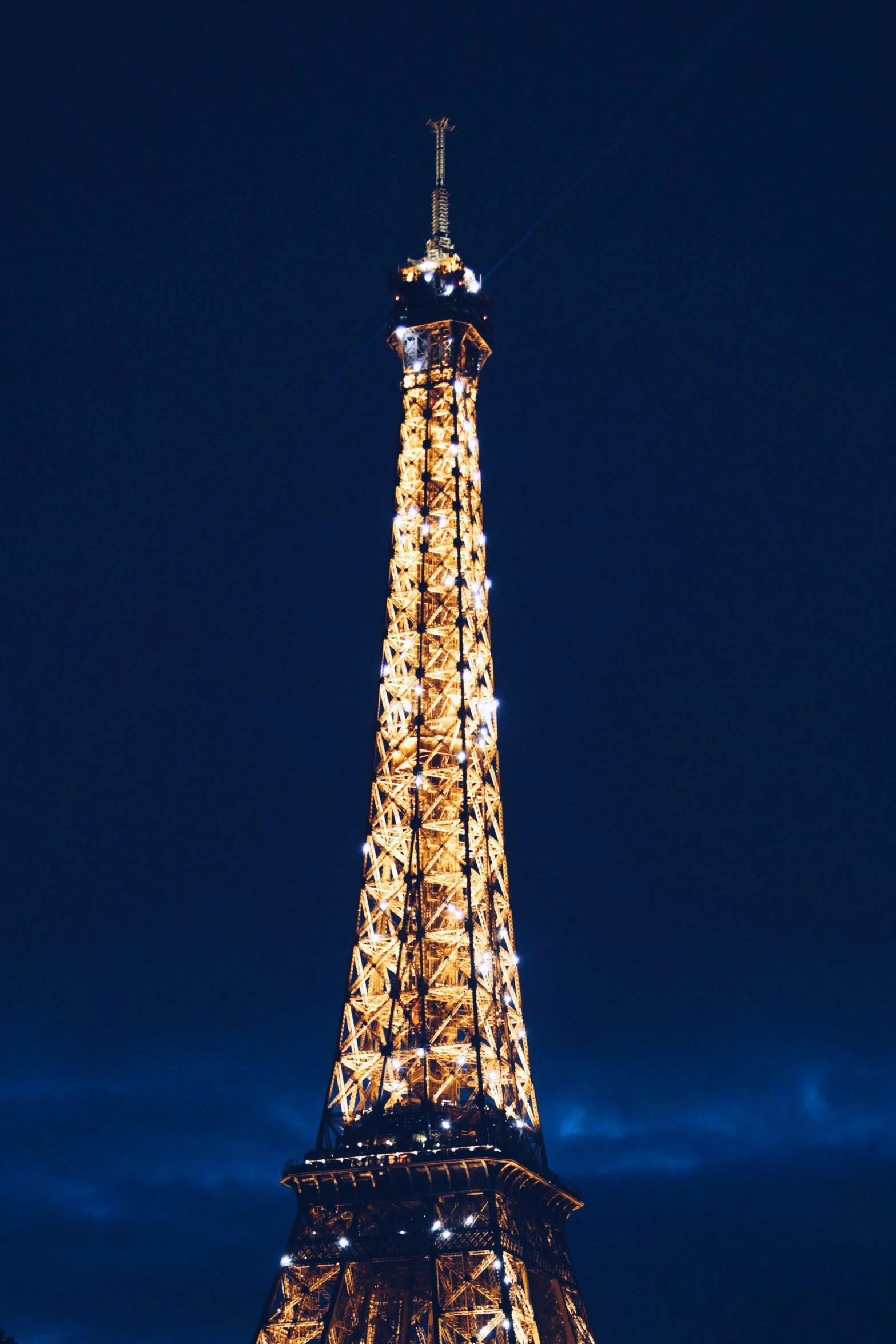 a very tall tower that is lit up