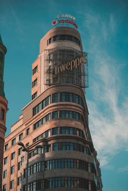 the view of an elaborate building with an interesting sign