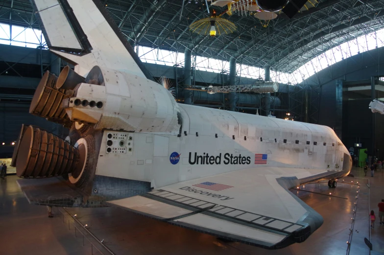 a space shuttle is on display in a museum