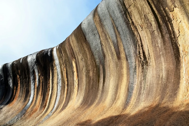 an artistic wall made of thin concrete with no vegetation