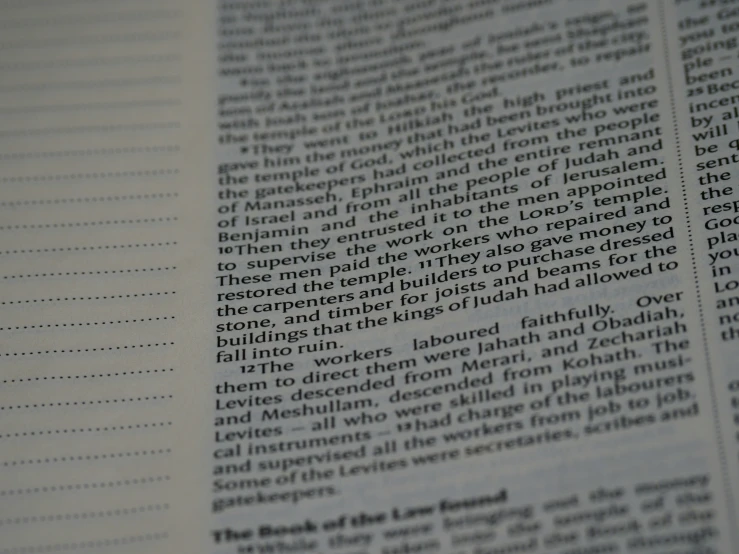 a close up of an open book containing text