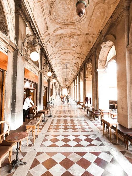 this building has ornately decorated columns and arches