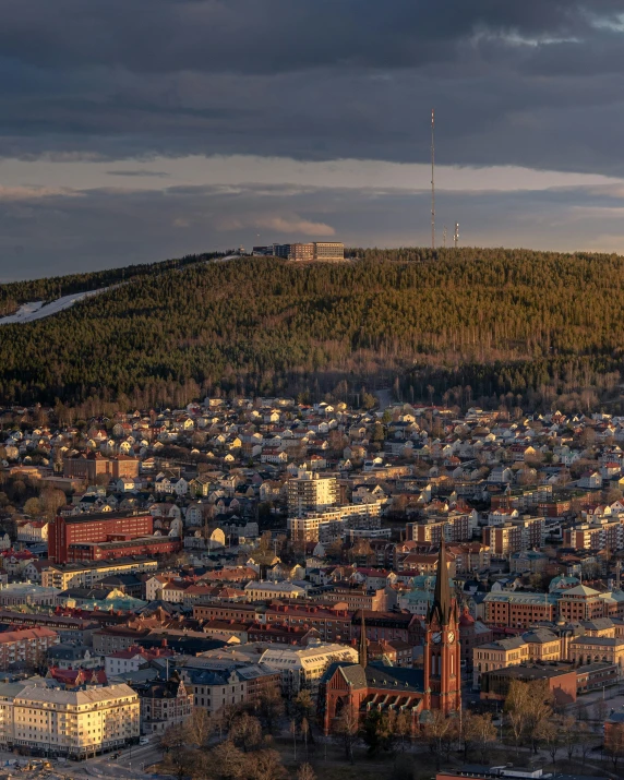 an aerial po of a city under clouds