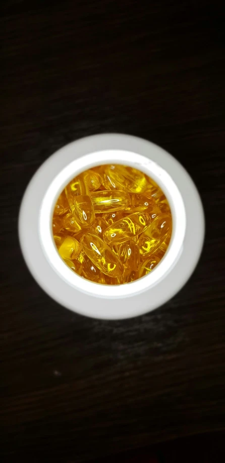 a white plate topped with jelly on top of a table