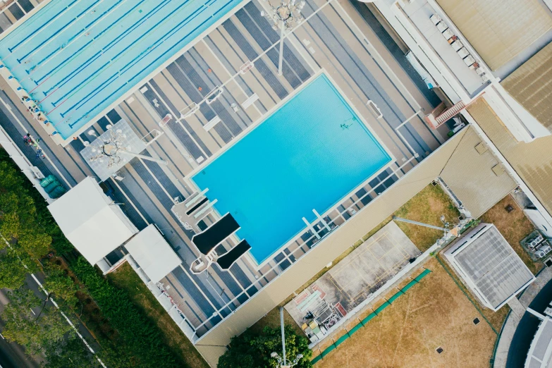 a swimming pool and building in a city
