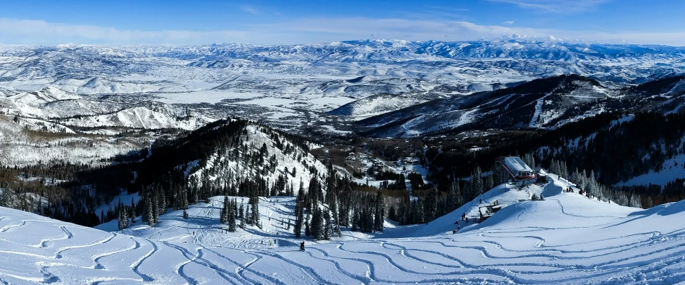 the landscape is full of snow covered mountains