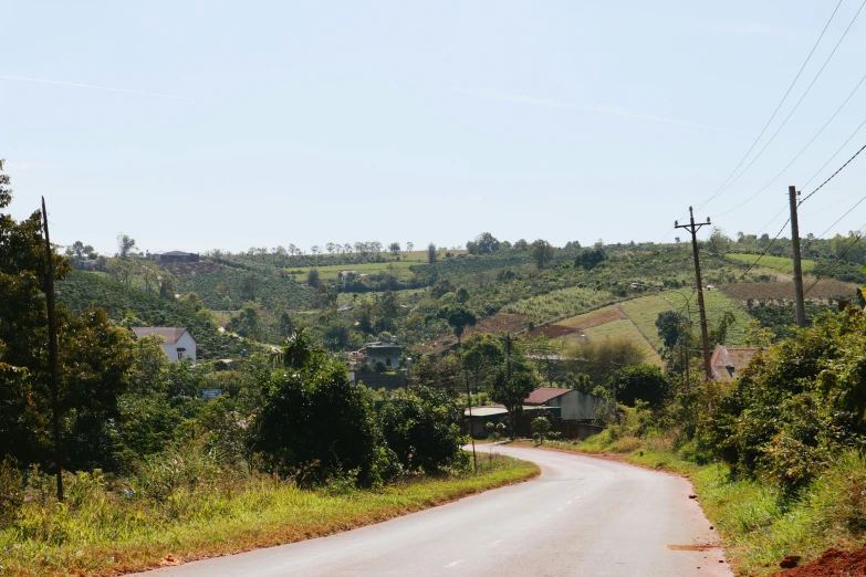 a view of a road with mountains in the distance