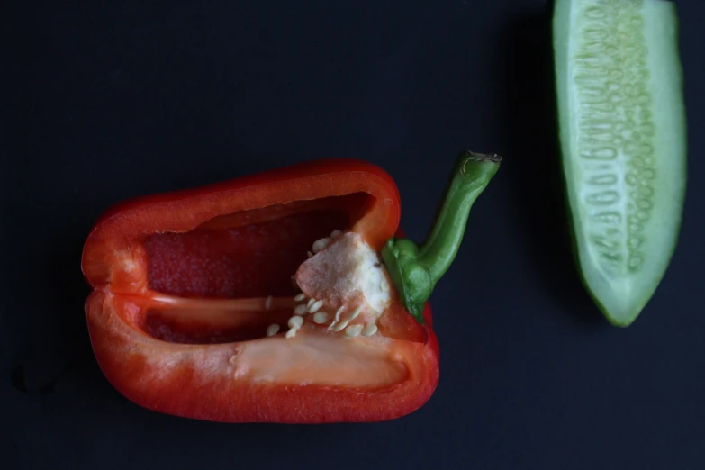 a couple of pieces of pepper with the insides still attached