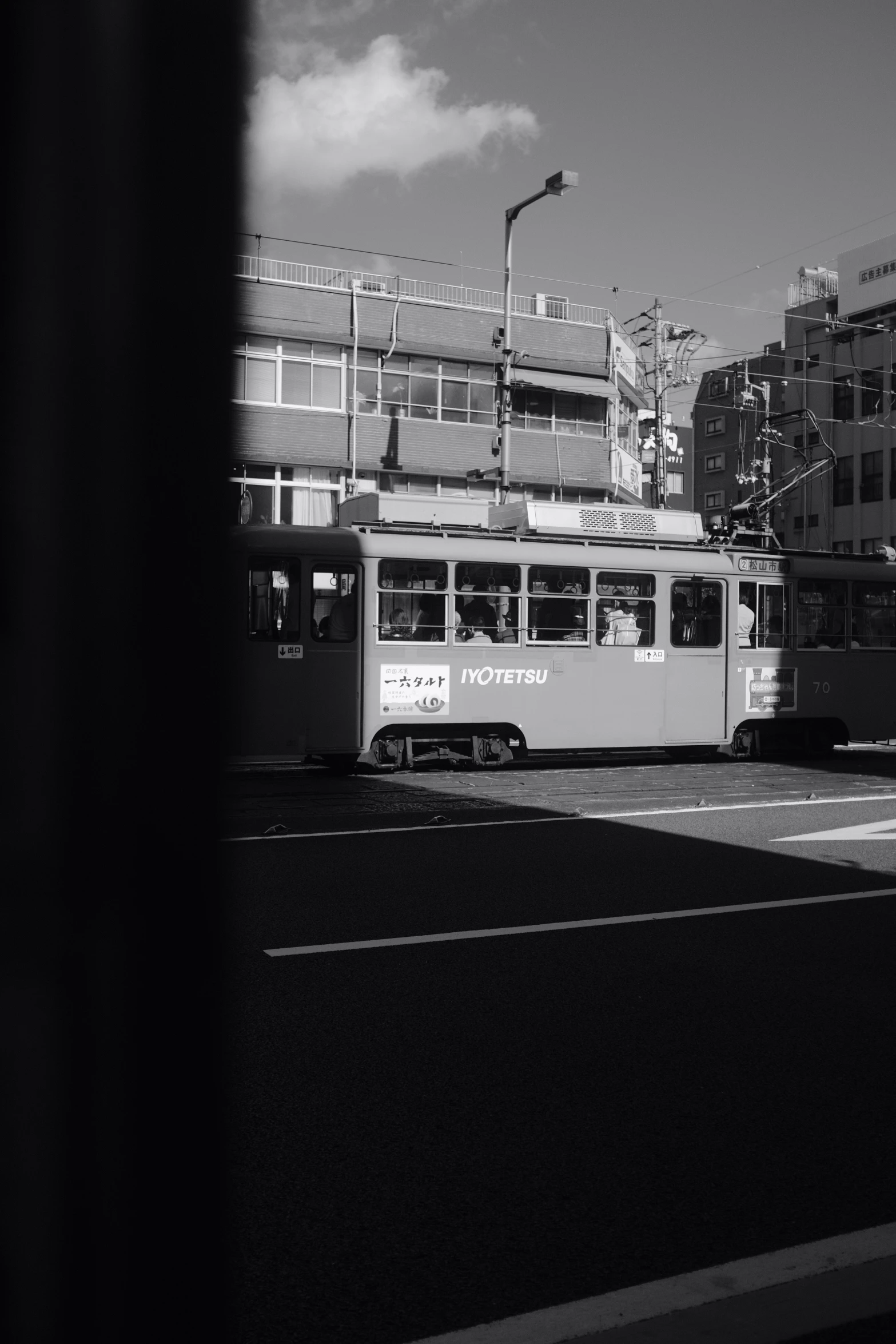 an image of a street scene taken through a window