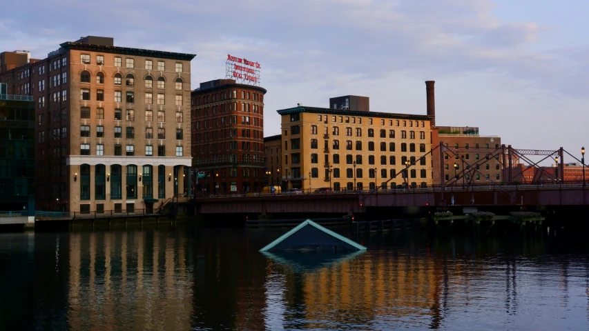 a picture of a small house floating on the water