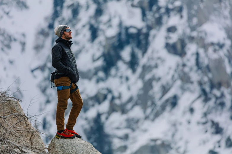 a person with an ice pack on top of a mountain