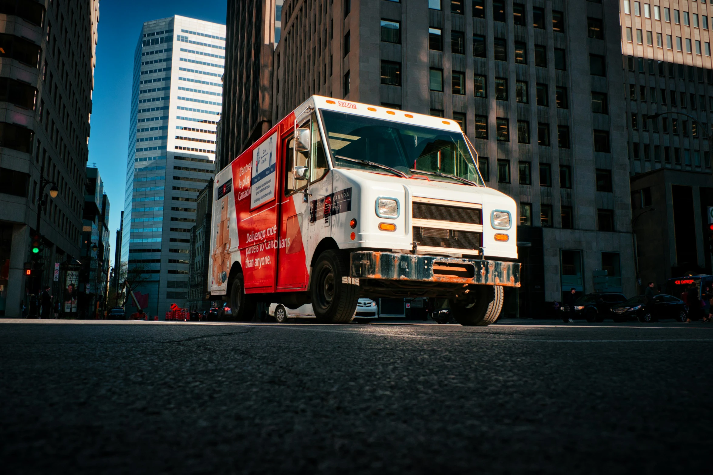 an ambulance vehicle parked on the street in a city