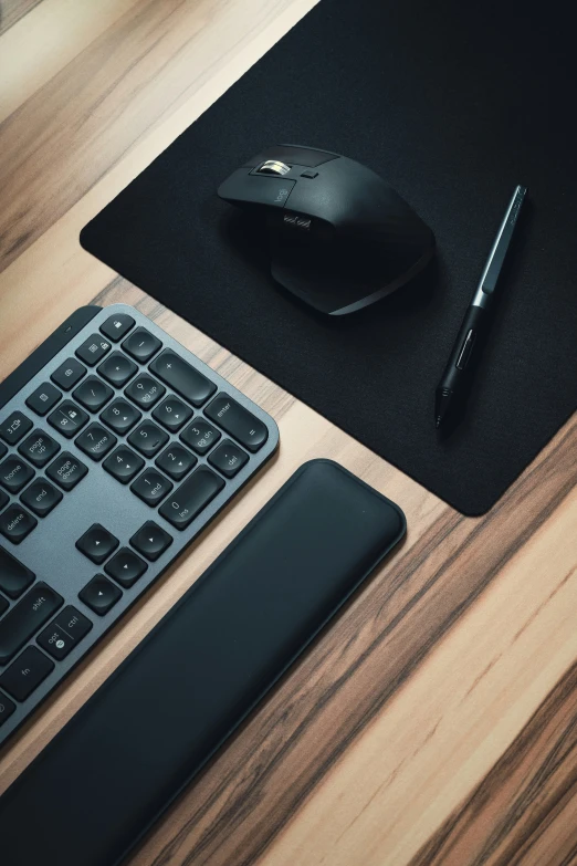 a desk with some mouse and a keyboard