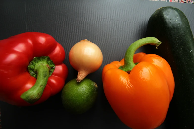 an assortment of veggies sitting next to each other