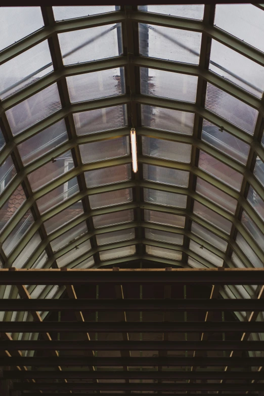 the view of a ceiling over a train station