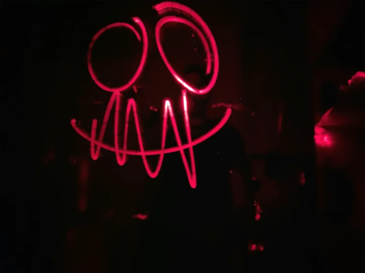 a light painting with the face drawn on