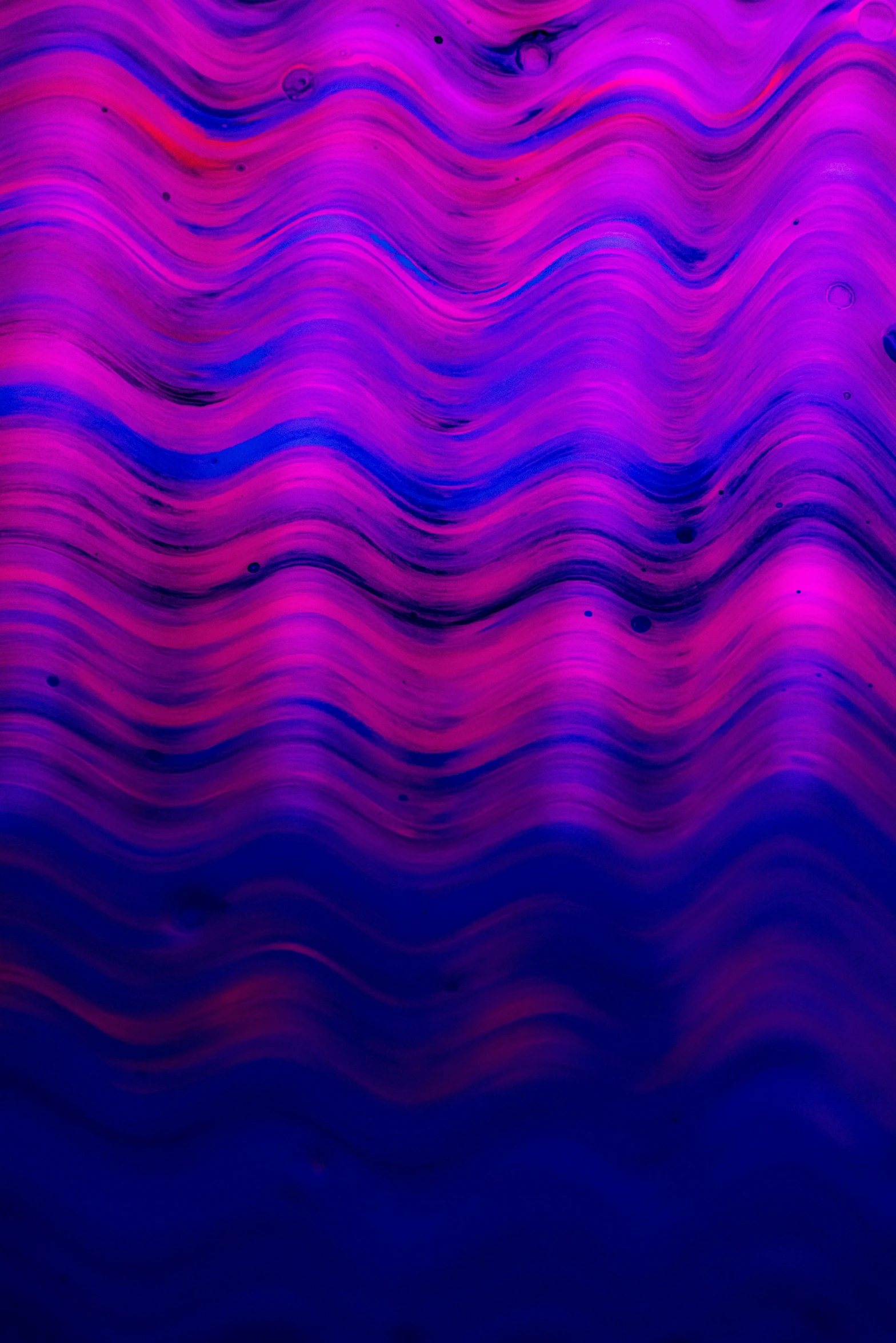 an abstract background with red and blue wavy lines