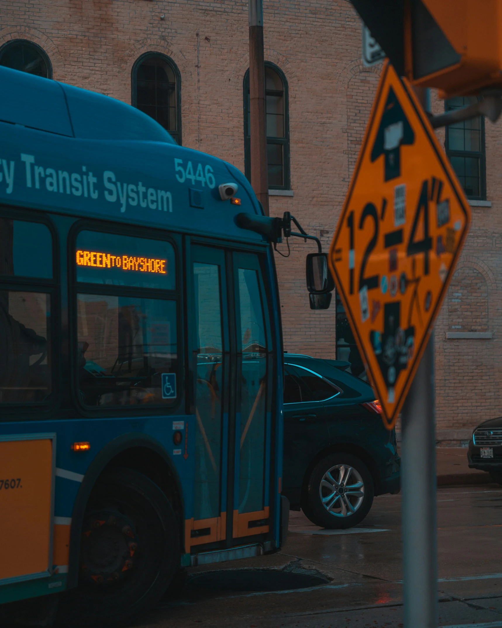 a bus stopped in front of a bus stop