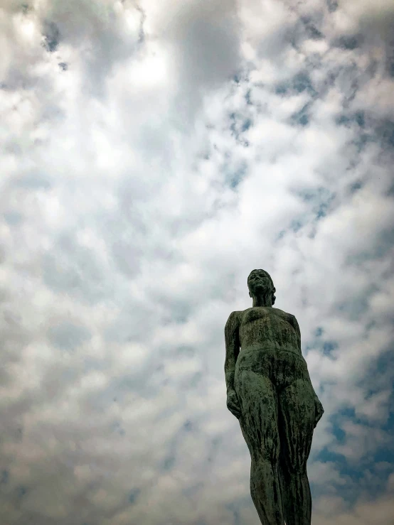 a stone statue is shown in the middle of nowhere