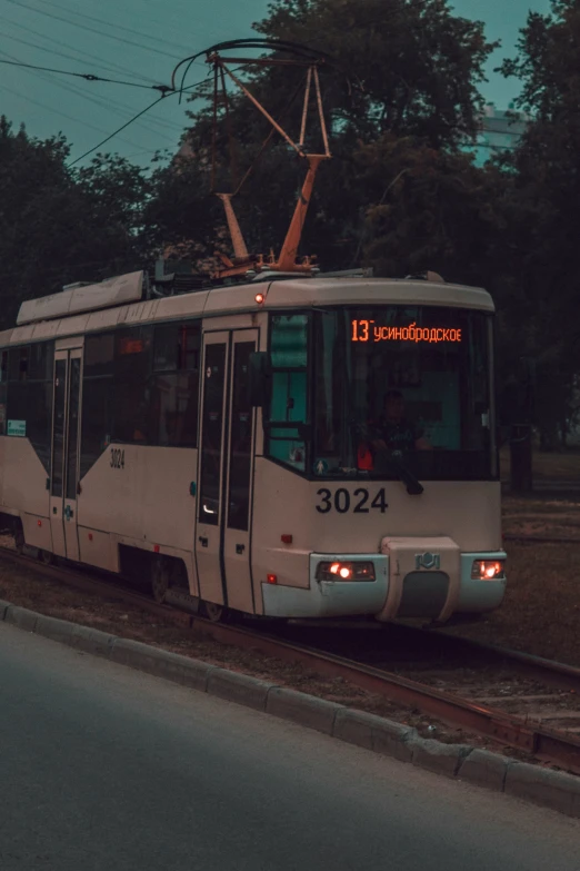 a bus that is sitting on the side of a street