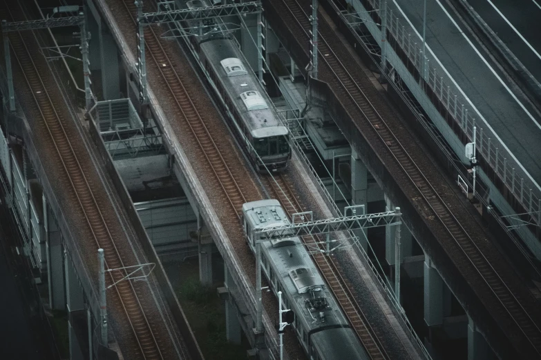 train tracks in an overhead view and building