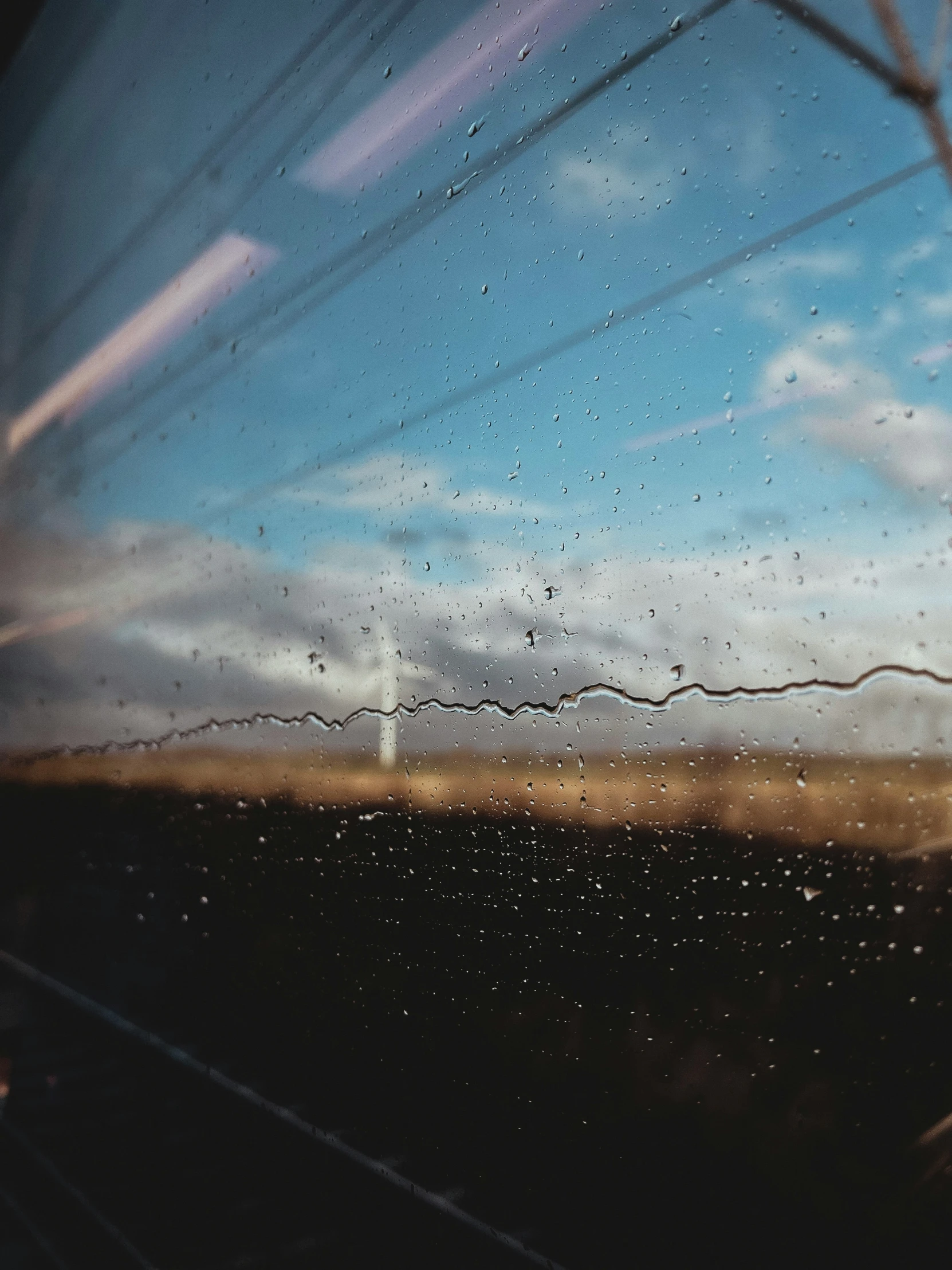 rain is gathered on the windows in a car