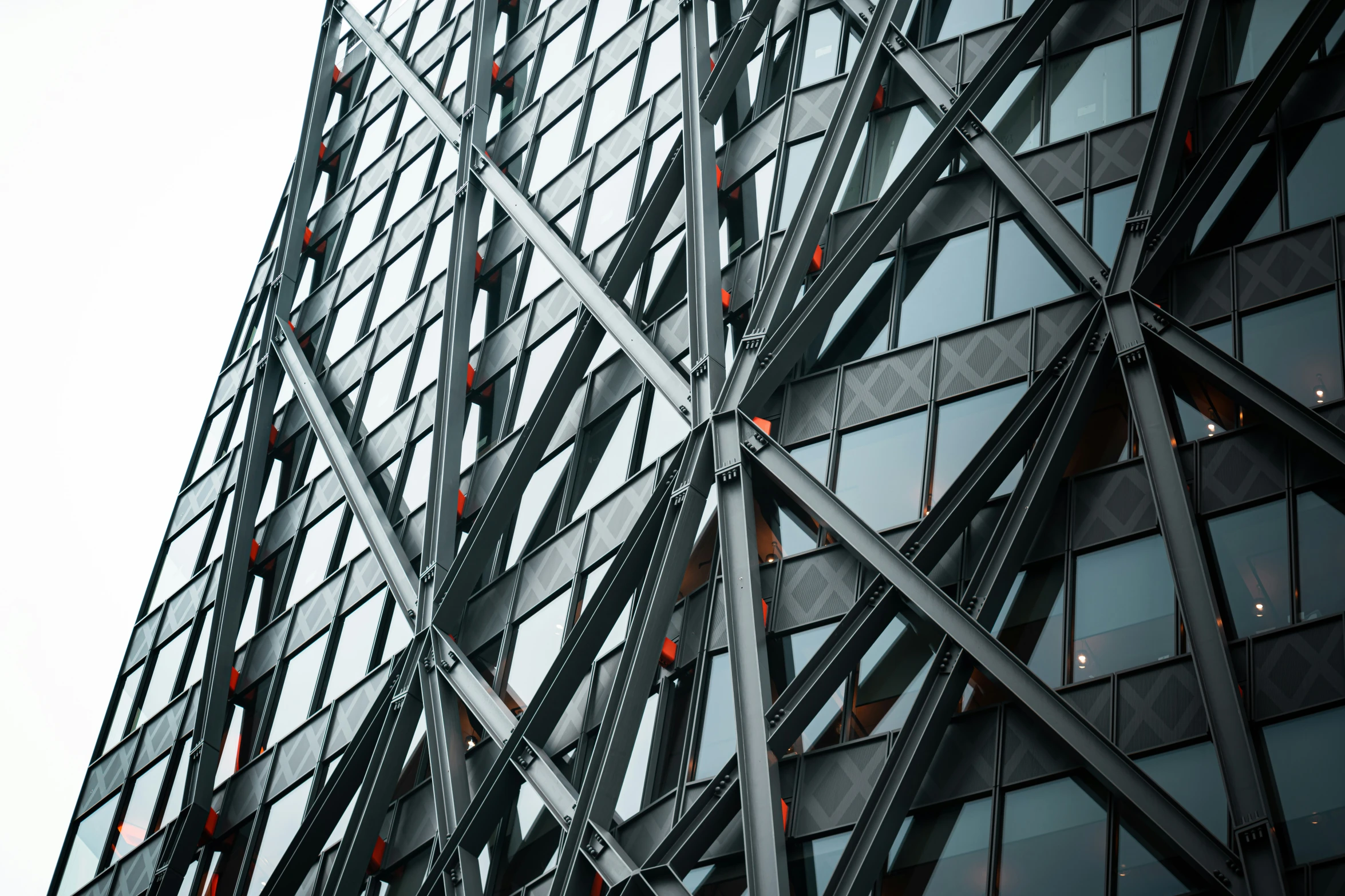 a building that is very tall and has a lot of red dots