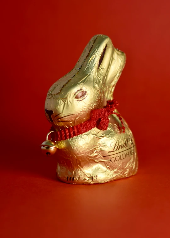 a gold foiled bunny that is made to look like a bag