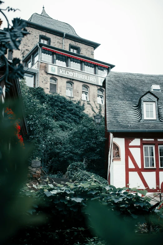 there is a house with a red and white trim