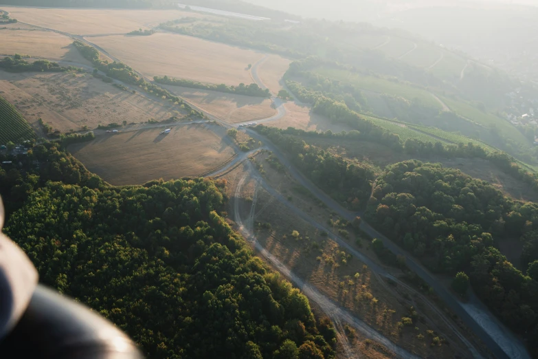 an aerial view of a small city in the woods