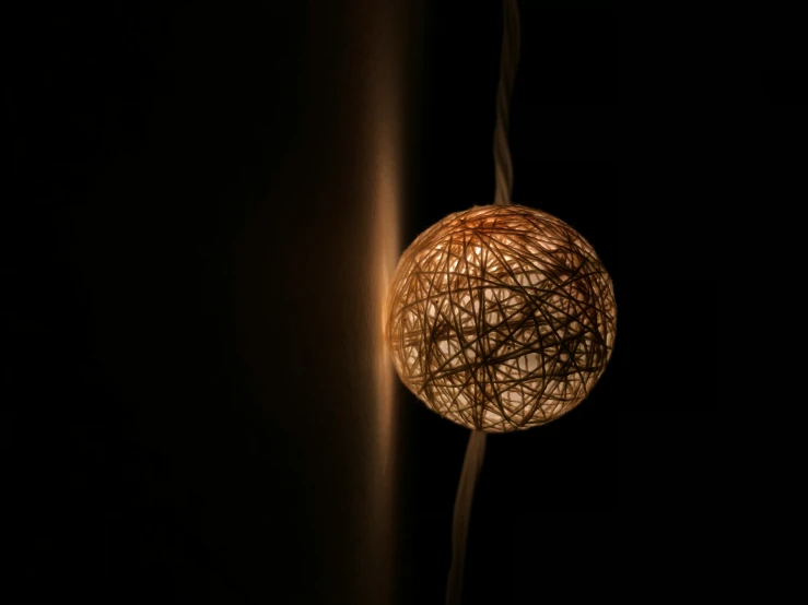 a light bulb with a dark background