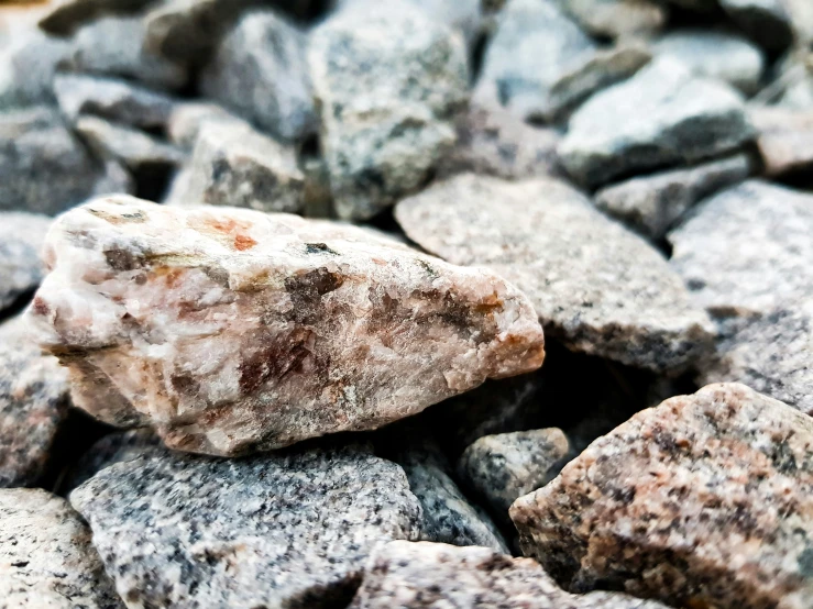 a pile of small rocks sitting next to each other
